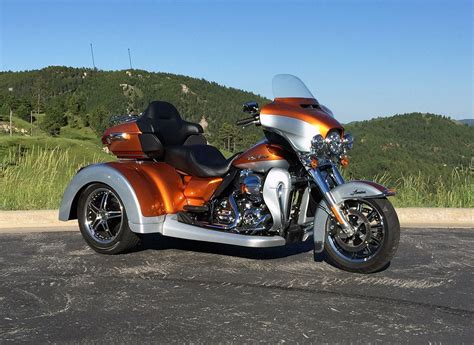 I thought about putting the fairing on the Freewheeler but decided to move to a full helmet last year and added a Sena system to it so I now listen to tunes that way. . Trike talk harley